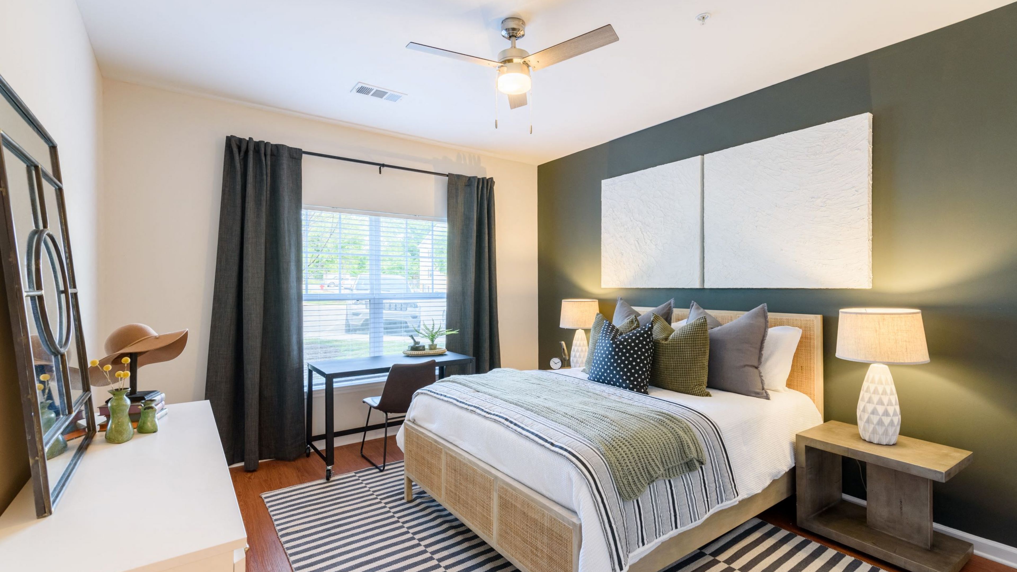Hawthorne at the Hollow spacious apartment bedroom with wood floors and large windows