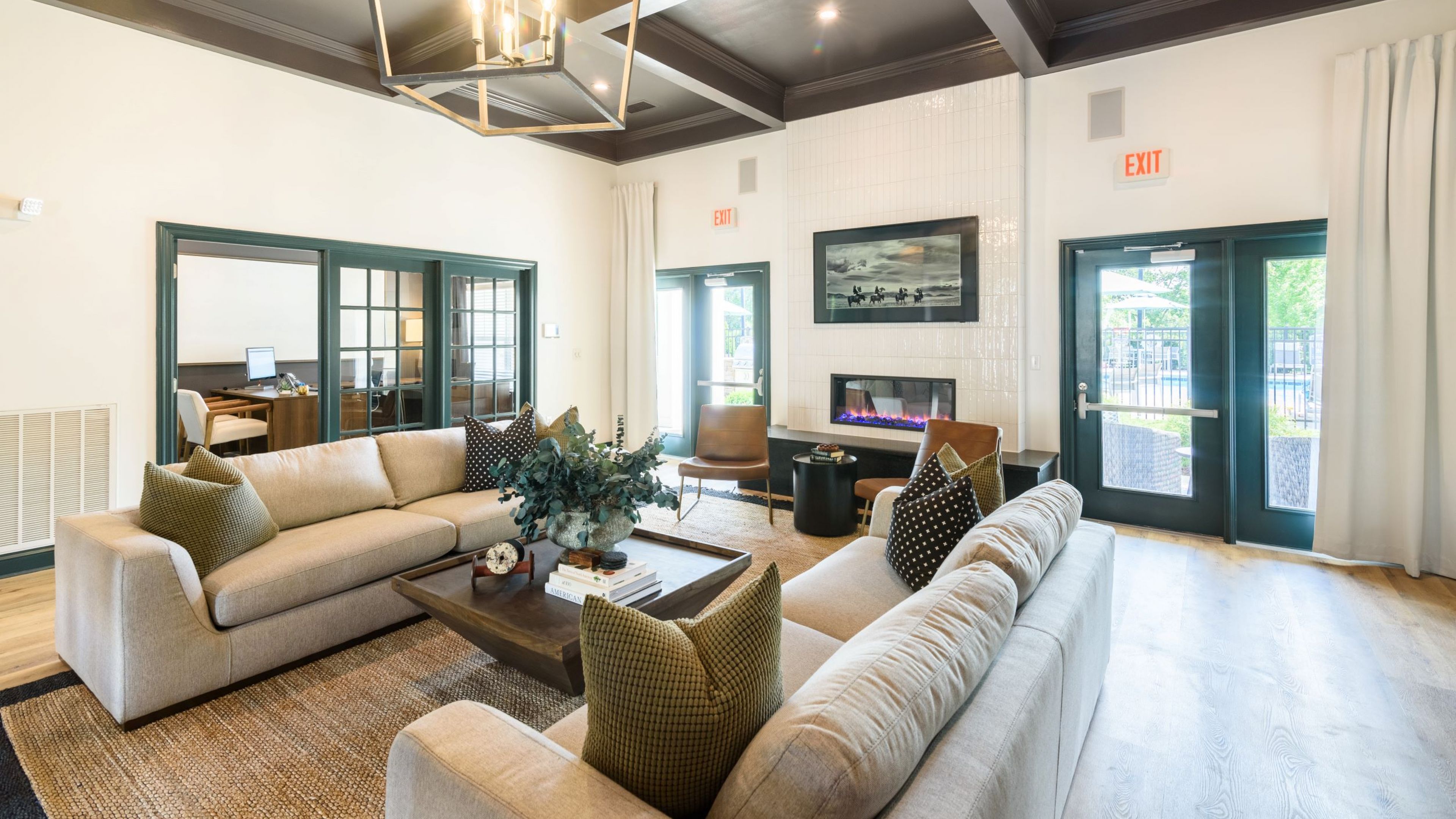 Hawthorne at the Hollow resident clubhouse amenity with seating area and beautiful finishes
